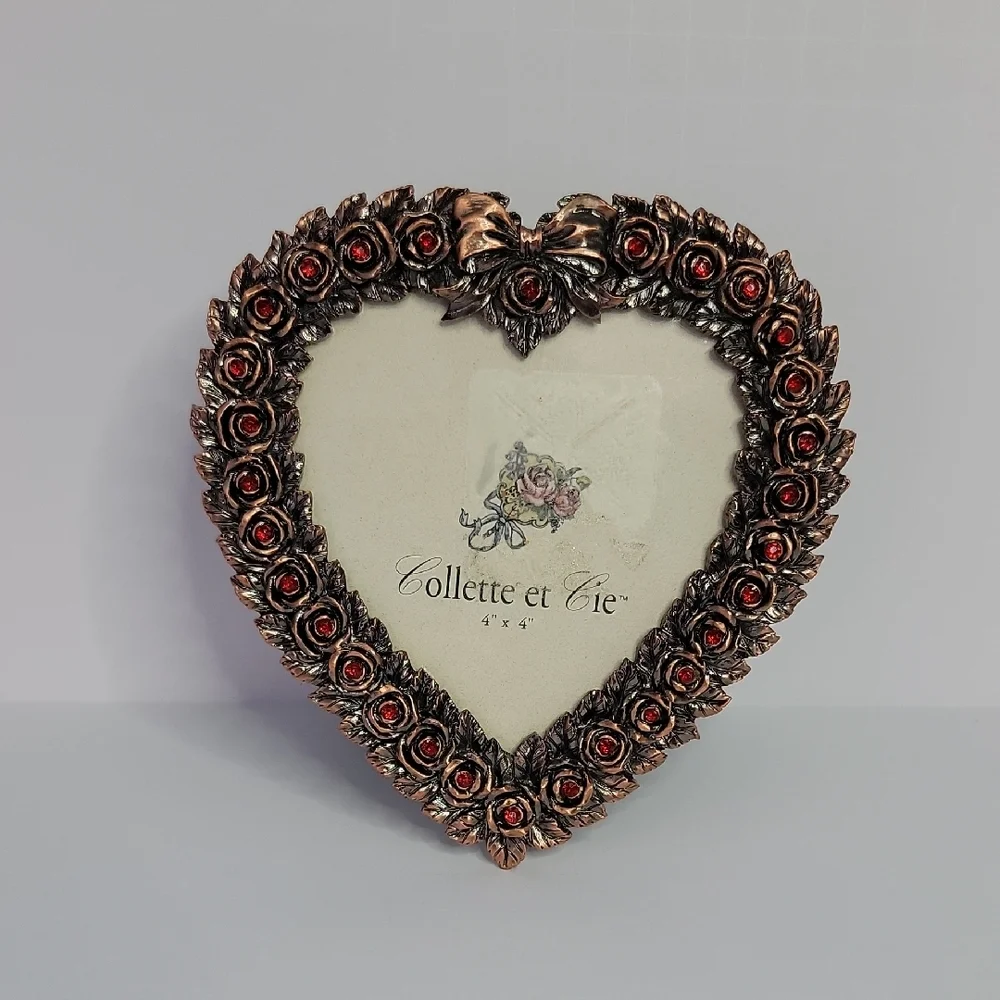 Heart-Shaped Bronze Frame with Red Accents